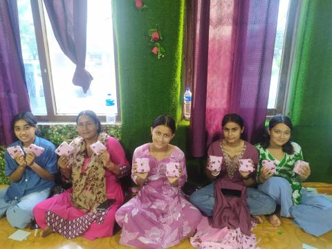  Pratiksha (far right) and her friends during the pad making training