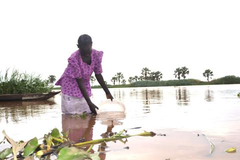 Madel fetching water from the river