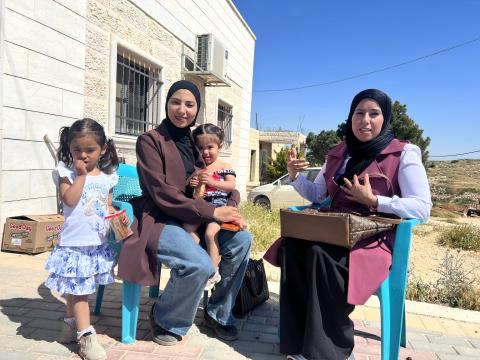 Nesmah and Ibtisam, a Community Health Worker, during a home visit in the West Bank