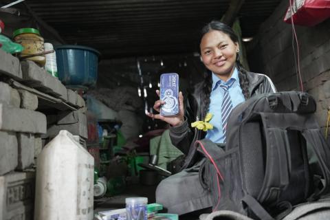 Asta shows school supplies supported by CDS and WVI Nepal. (© 2026 World Vision International Nepal/Deepshikha Shrestha)