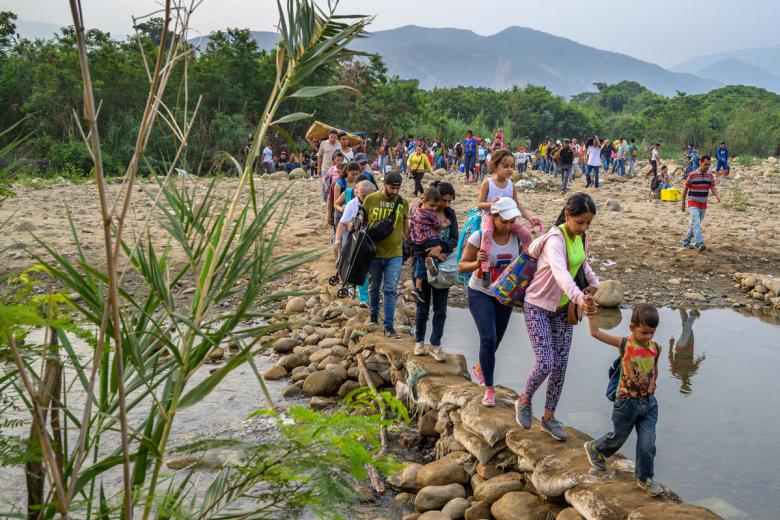Venezuelans crossing the border to Colombia
