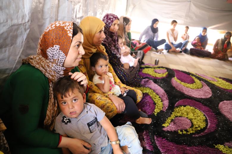 Syrian Refugees attending WORLD Vision parenting sessions