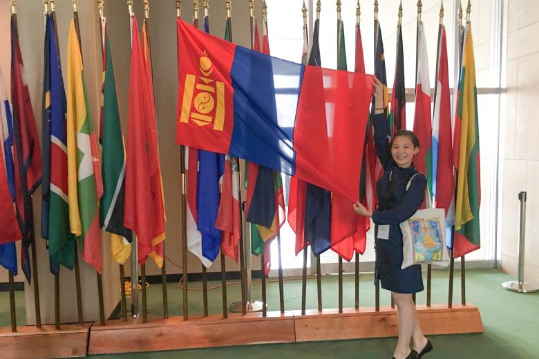 Mongolian girl at UN with her flag