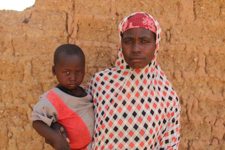 Fatchima with her son, Mohamed, 3, in the village of Eguidi