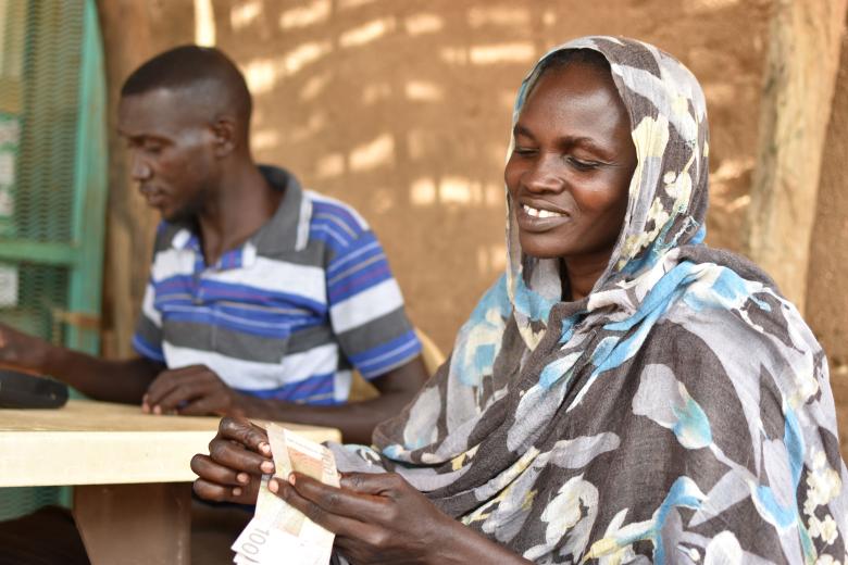 Khaltoum can buy items of their choice to meet their household needs: Dignity of choice, as the beneficiaries like to sum it up.