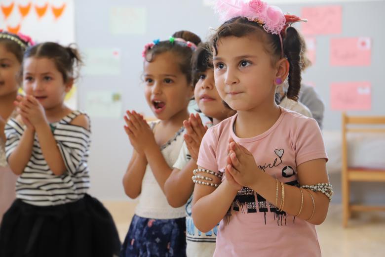 Amina participating in her class