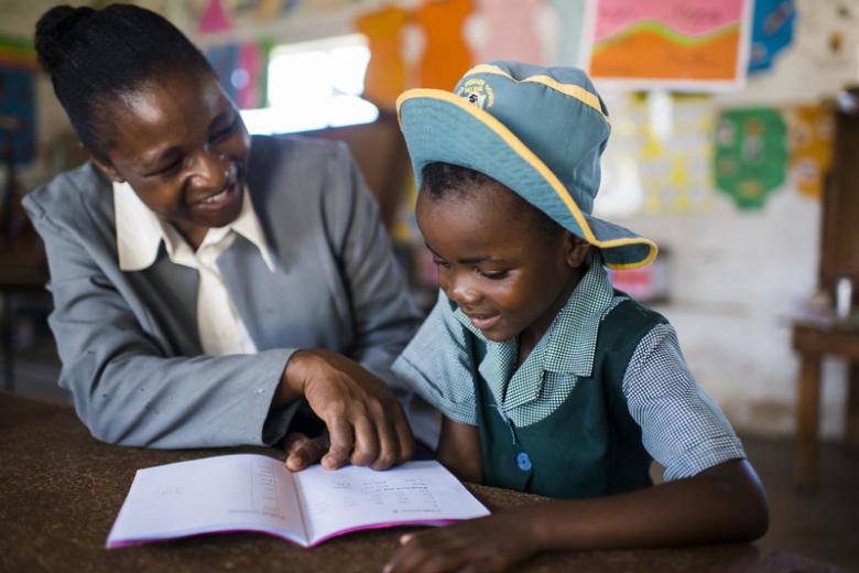 Teacher and child reading
