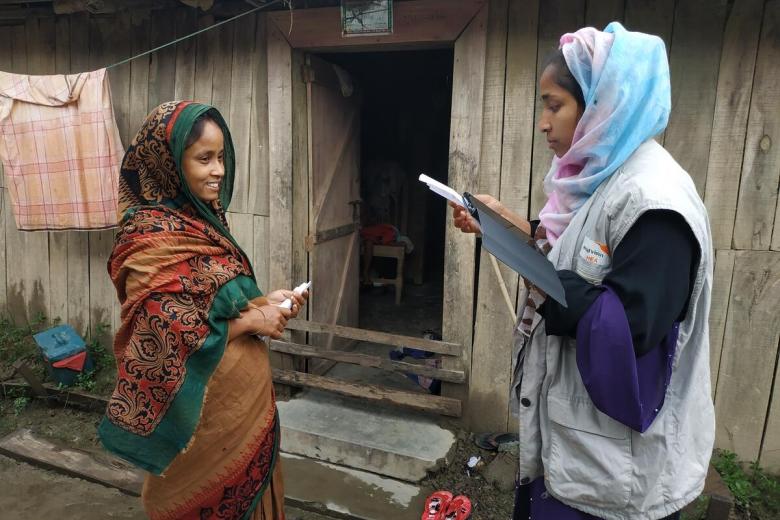 Beneficiary registering for cash assistance after floods affecting Bandarban, Bangladesh