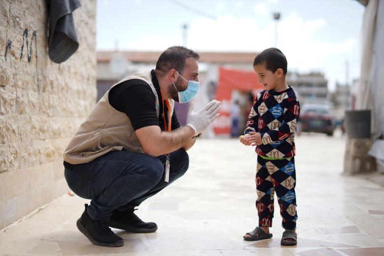 The WASH team reminds Syrian refugee children of the handwashing steps