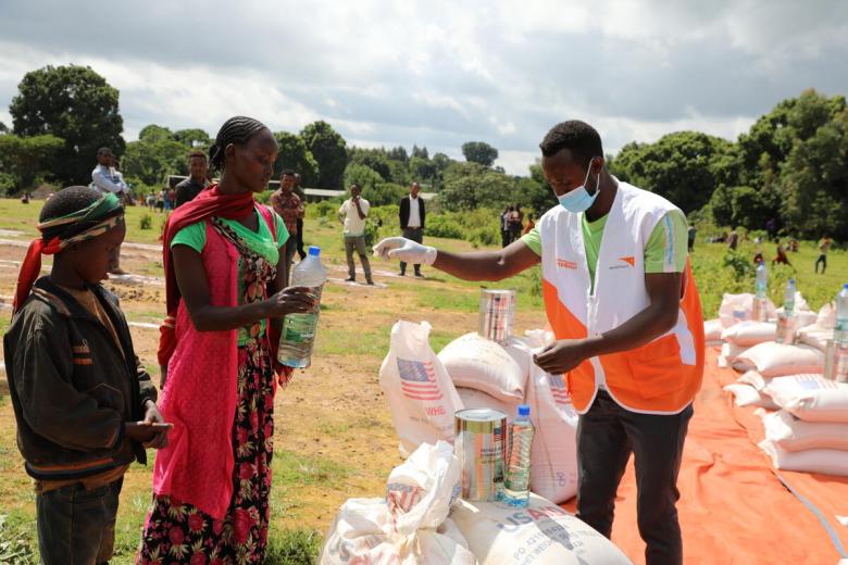 World Vision staff distributes food in Ethiopia