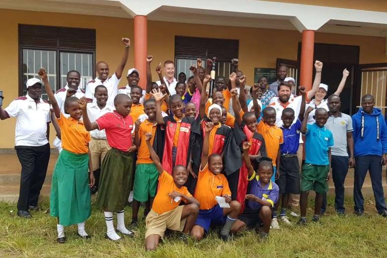 Busia children parliament pose for a photo with visitors from National office and WV Ireland