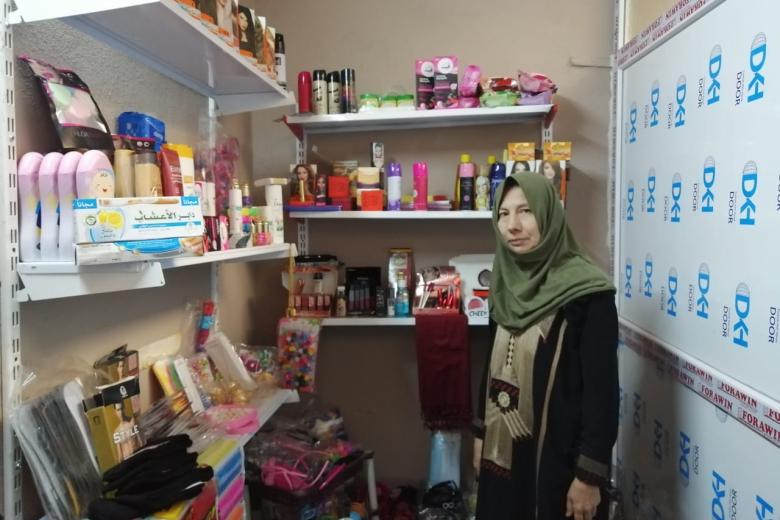 Rafida in her home built in shop