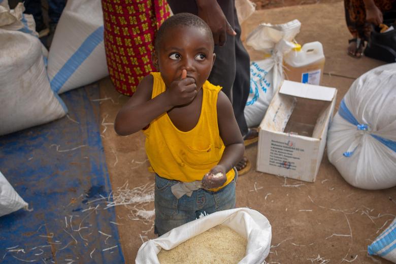 Child eating food from a bag