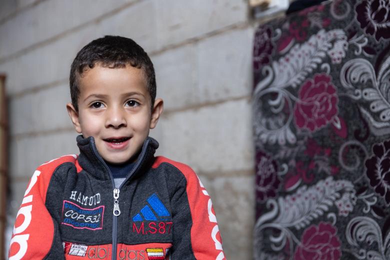 Baraa, four-year-old Syrian refugee boy, enrolled in remote early childhood education session with WVL in Bekaa