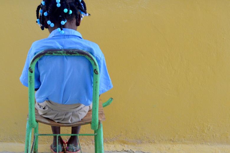 DR girl on a chair
