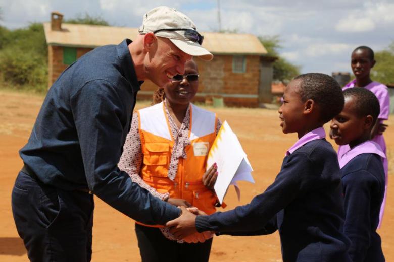 World Vision President and CEO, Andrew Morely, meets children in Kenya