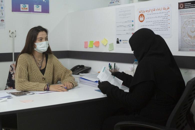 Jana* in IGAM's Info Hub in Turkey receiving consultation