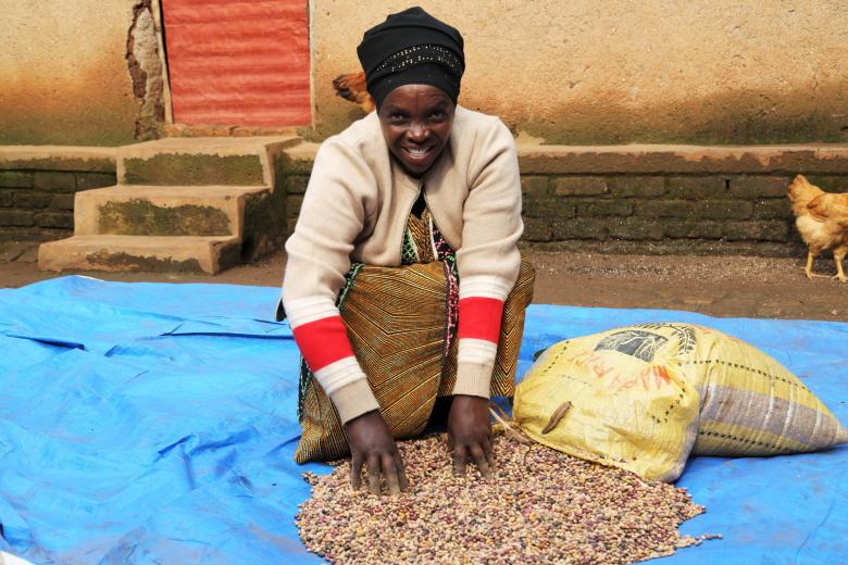 Victoire with her harvest of beans