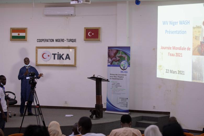 World Vision Niger WASH Director presenting at the conference