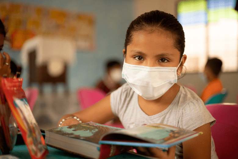 Child in mask in Chile