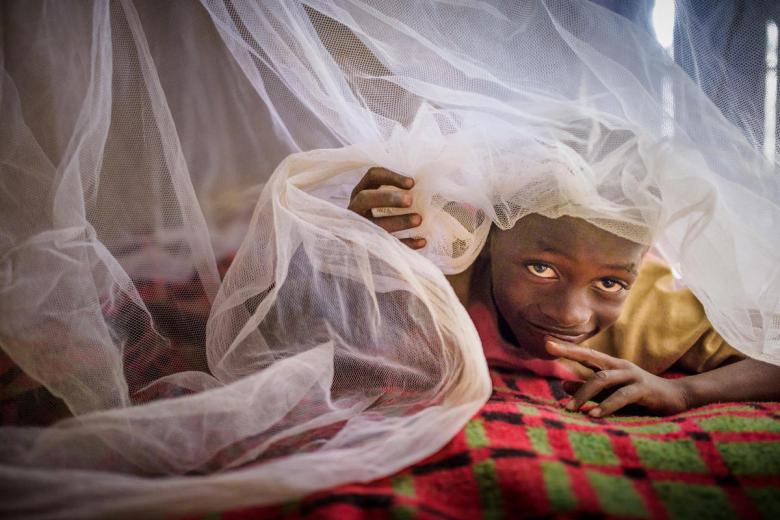 Steven in Zambia no longer suffers from malaria now he has a mosquito net.