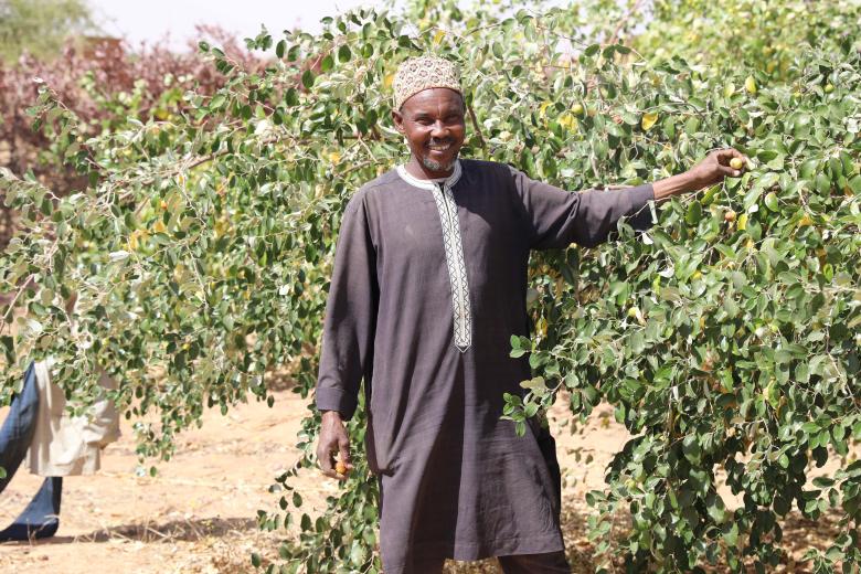 Issaka in his farm