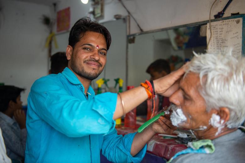 Hemant started his barbershop 13 years ago with a kit from World Vision India