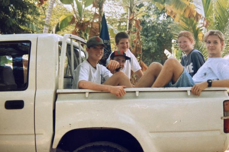 Andrea in a van with other teens