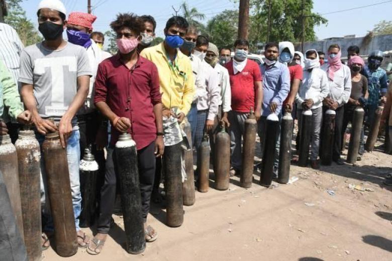 Krishna, in line to buy an oxygen tank for his father