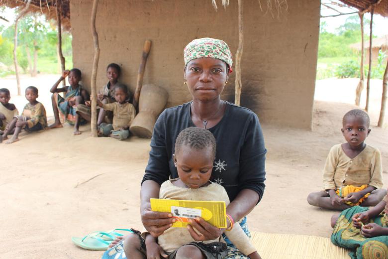 Three-year-old Felismina in Mozambique with her great-aunt Elisa.