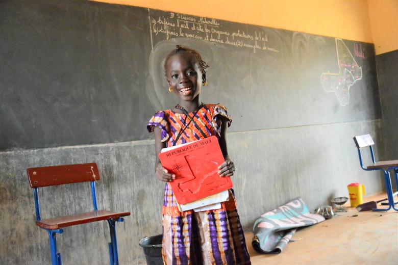 Little Aichata an 8-year-old student in 3rd grade living in Mali’s conflict-affected areas with her 