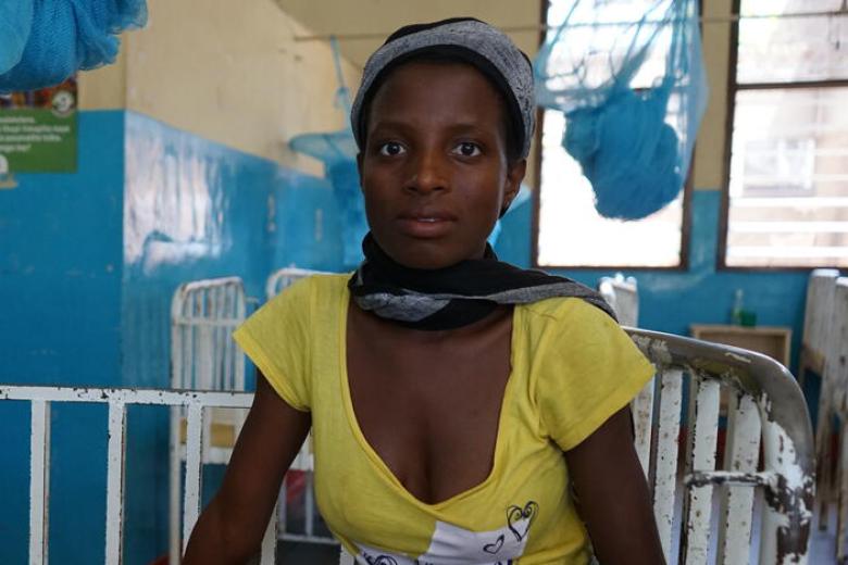 Melise at the hospital where her baby is being treated for malaria.