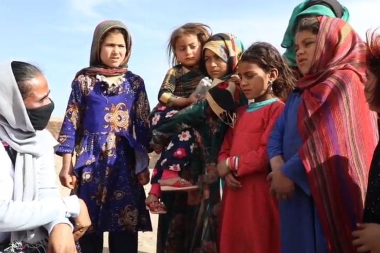 Asuntha Charles with girls in Afghanistan