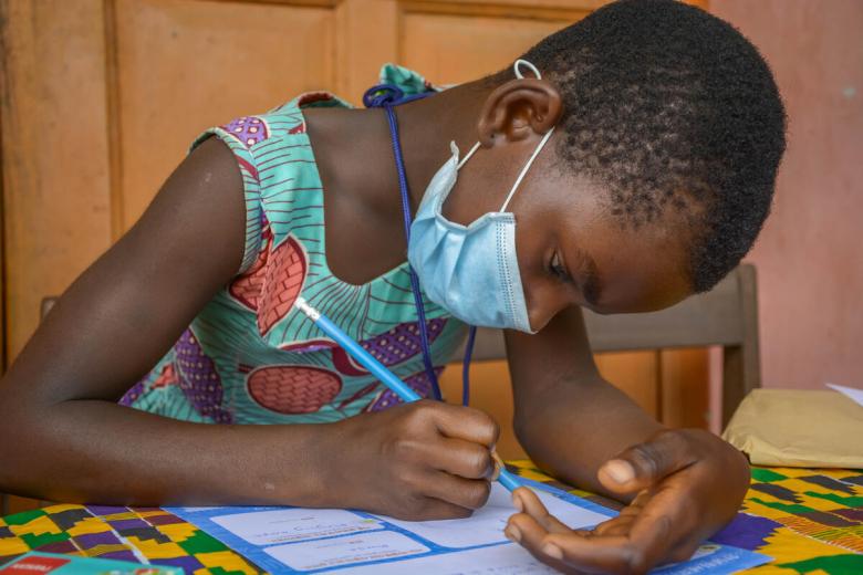 Child writes a letter to her sponsor
