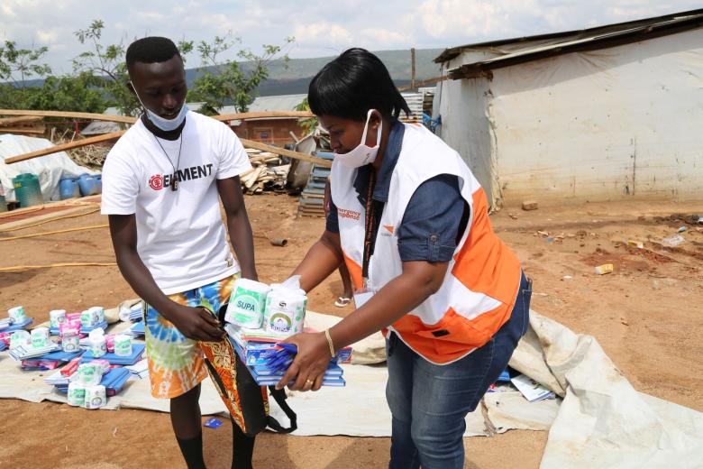 Patrick receiving school materials