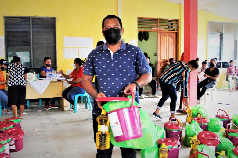 Natalino is receiving hygiene kits and food baskets from World Vision. Photo: Anita Marques/World Vision. 29 April 2021