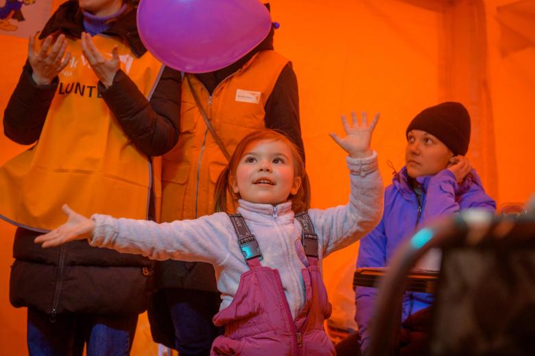 Ukrainian 4-year-old playing with a balloon