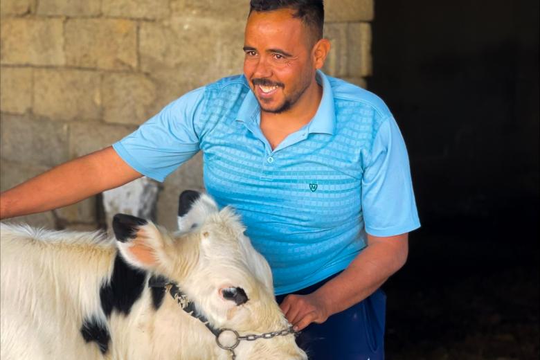 Arjan happy with his cow