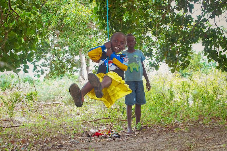 Mary enjoys swinging on a tree