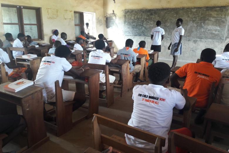 Janet educates kids members on the dangers associated with child marriage