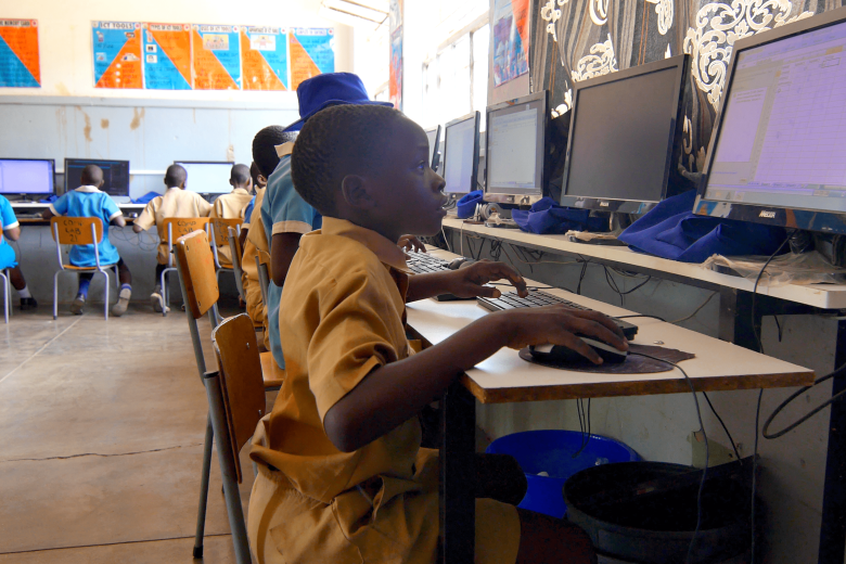 A learner at St Mary's Primary School in Hwange, Zimbabwe during ICT lessons