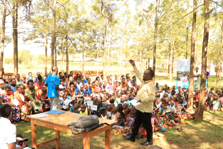 Parents and children gathered during a community engagement session