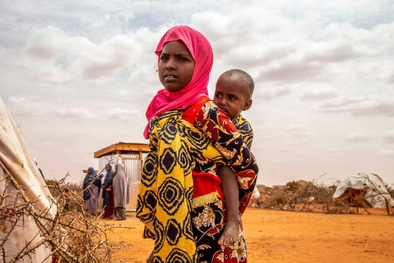 Forced to flee their homes due to either conflict or drought or both, children like 10-year-old Ebyan (and women) make up the majority of the population living in makeshift settlements.