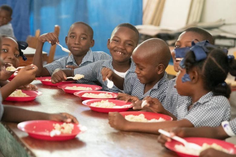 Children eating food at school
