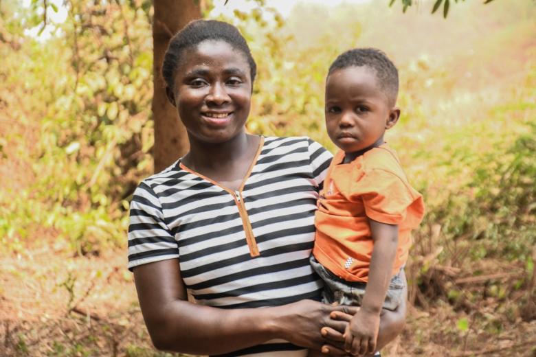 Evelyn, IFP beneficiary in Kwabia with her son.