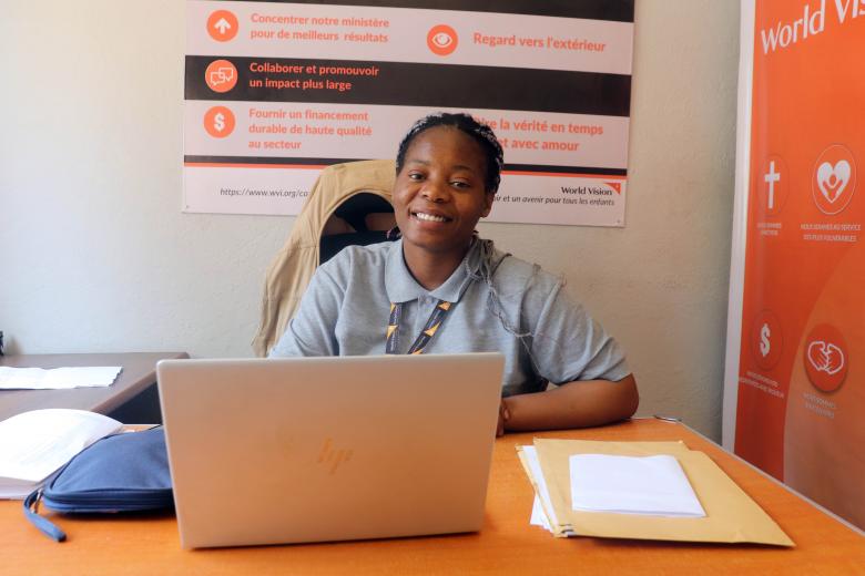 Manuela, a World Vision staff in her office