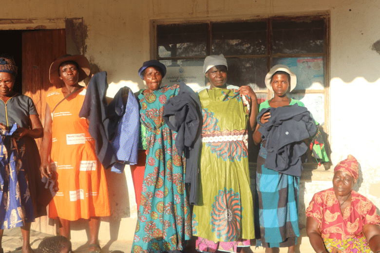 Tendaiishe Sewing Group members pose for a group photo