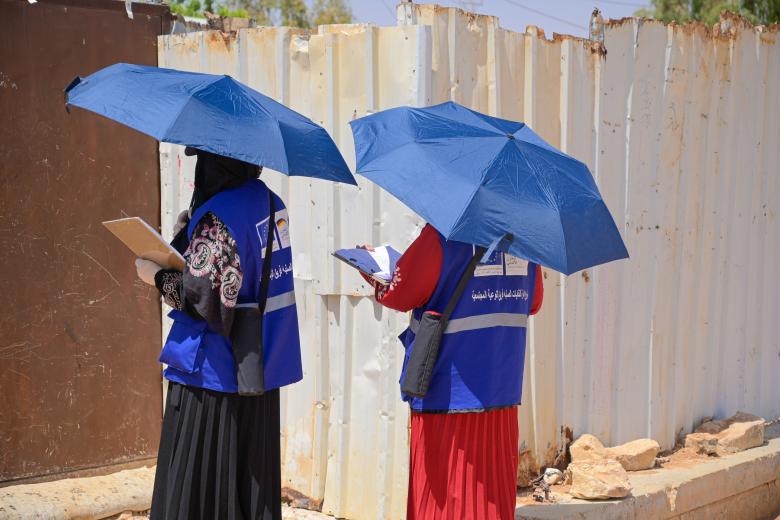 Aya and Sarah conducting door to door awareness sessions in Azraq Camp for the Solid Waste Management Programme.