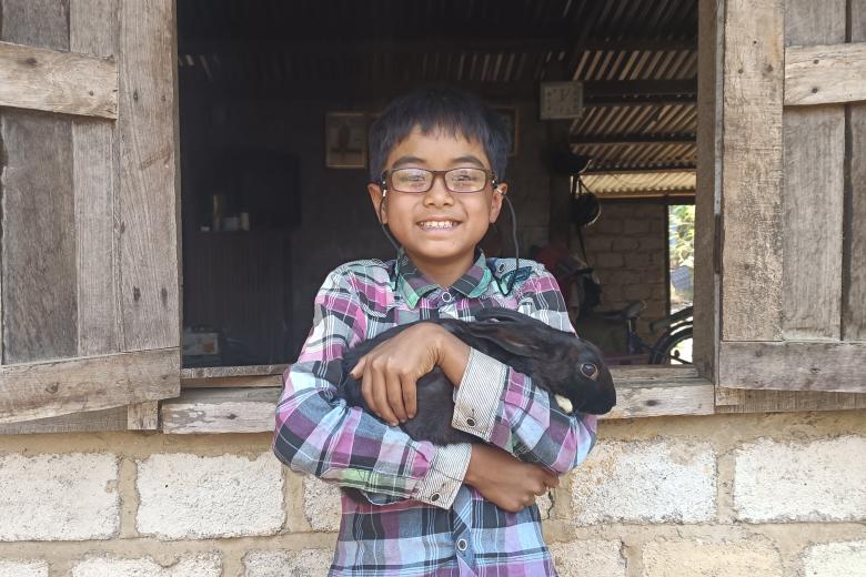 Kyaw wearing eye glass provided by the project