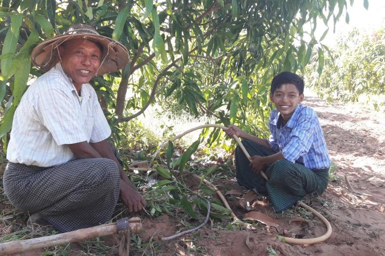 Thet and his grandfather are at their farm